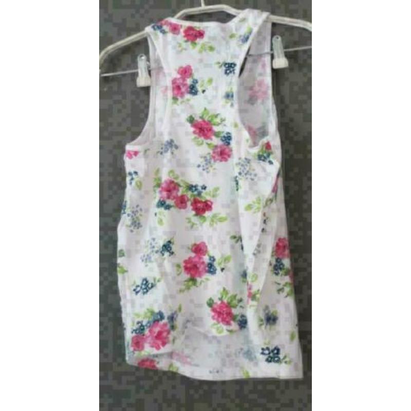 Benetton wit mouwloos bloemen shirt maat 146