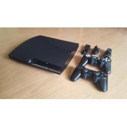 PS3 Slim met 2 controllers en 9 spellen!!